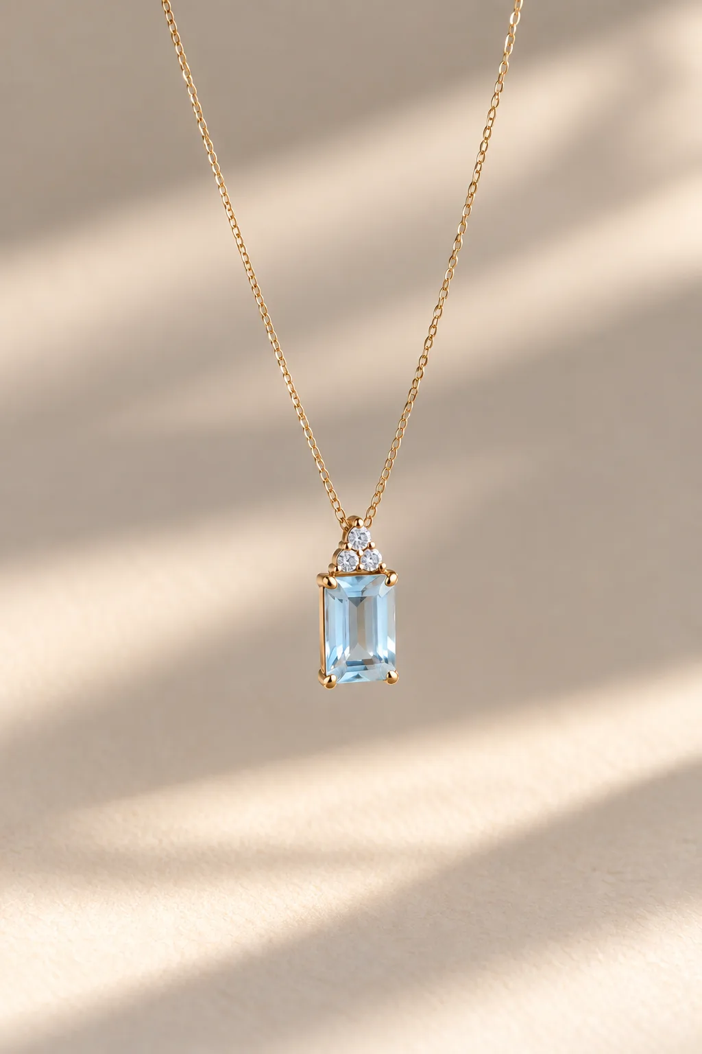 GOLD BLUE TOPAZ NECKLACE